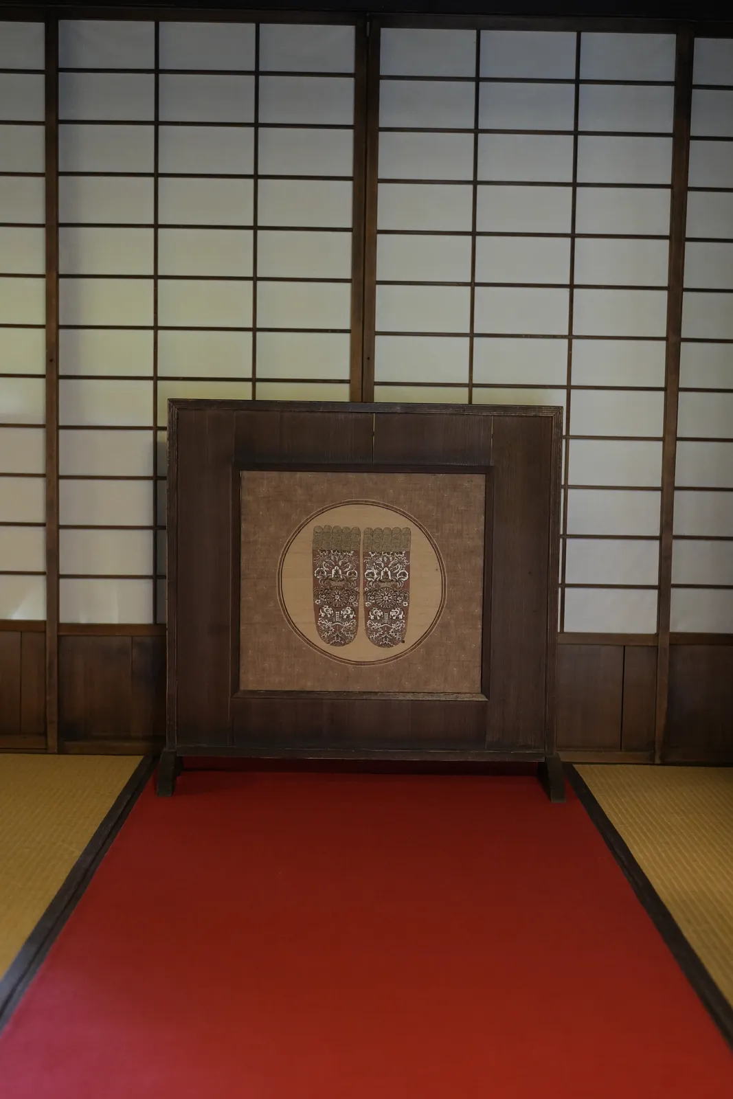 Tatami hall with paper sliding screens at a Zen temple in Kyoto