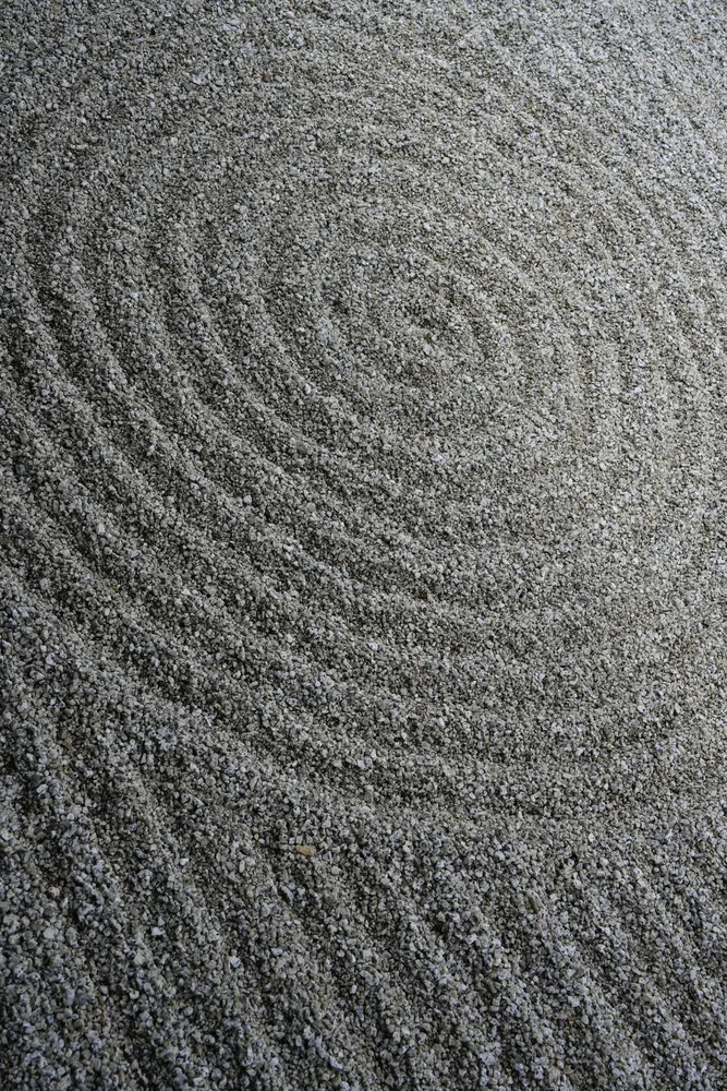 Raked gravel in a Zen garden in Kyoto
